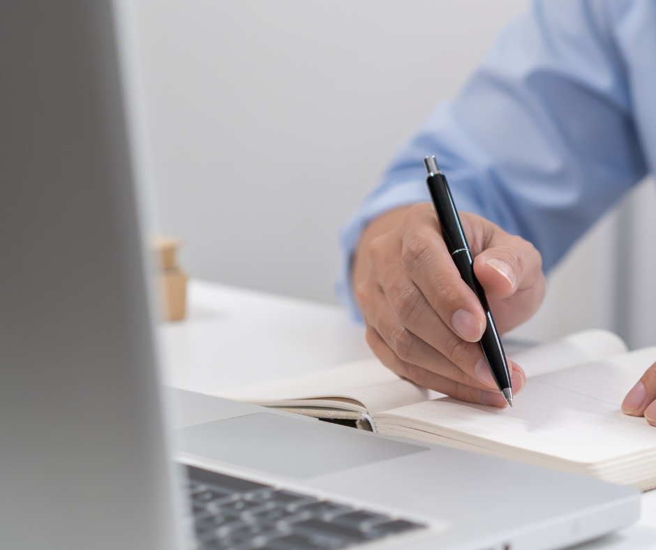 UAE tax compliance expert reviewing e-invoicing documentation - Suntech Auditors Dubai